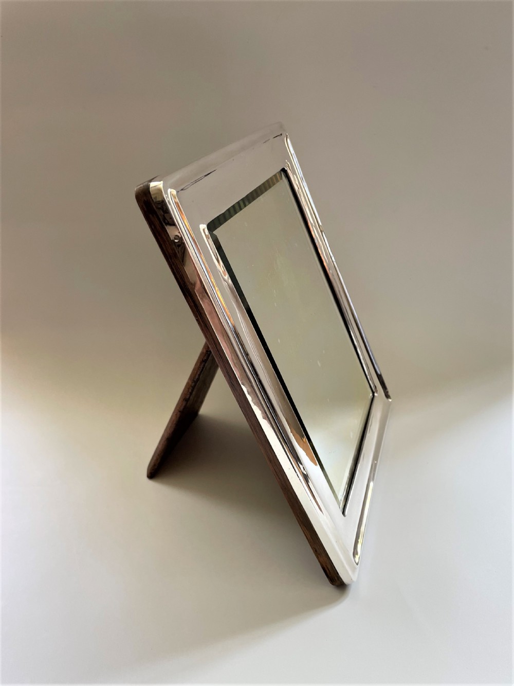 A stylish and desirable George V silver table mirror View IV