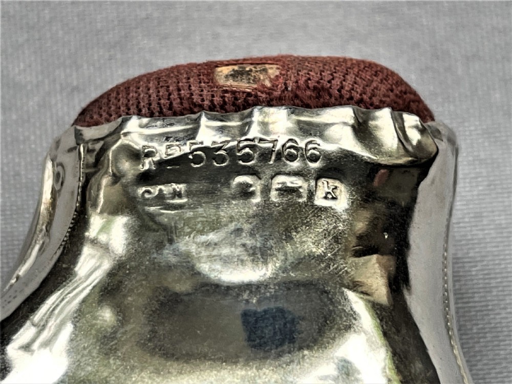 An extremely rare Edwardian silver roller skate pin cushion View VI