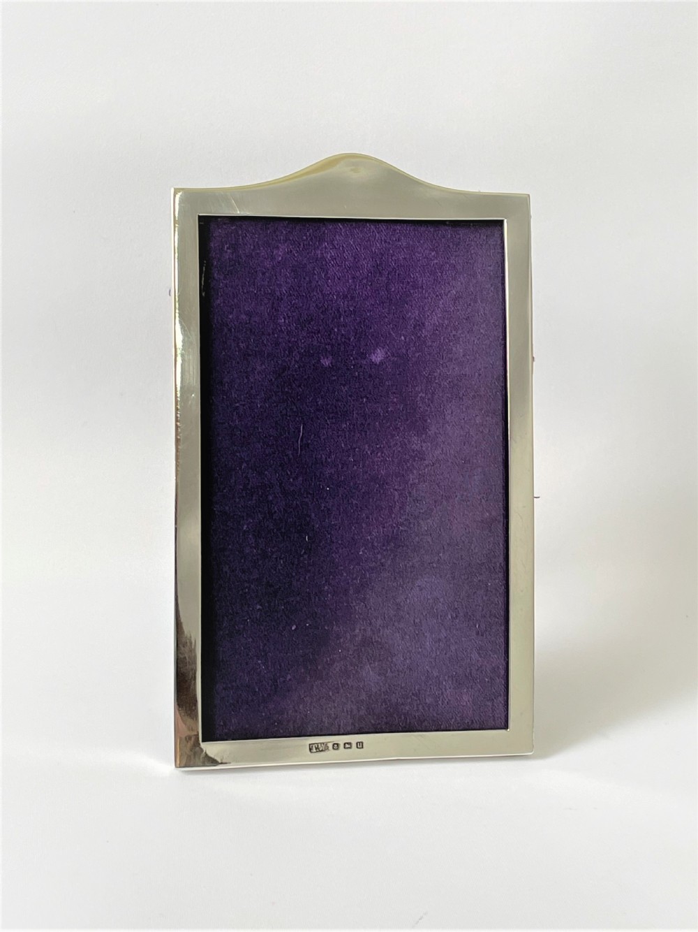 A small silver portrait photo frame View II