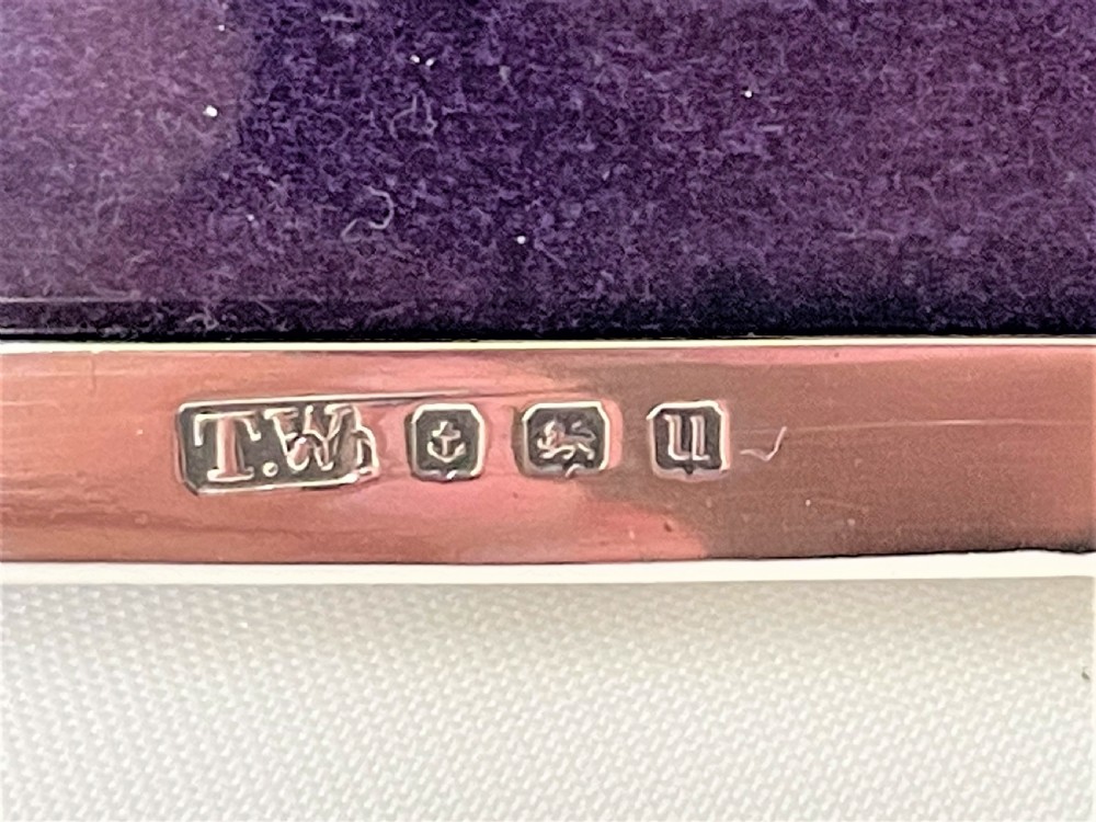 A small silver portrait photo frame View III