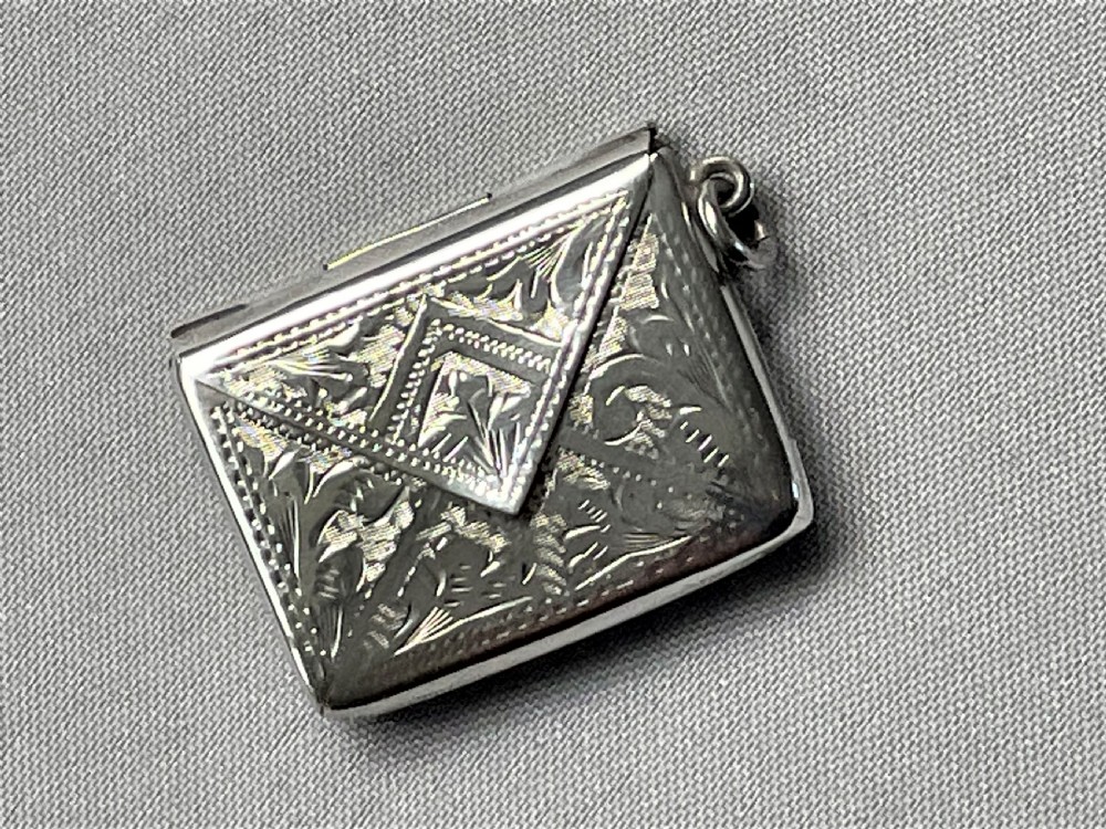 An Edwardian silver novelty stamp envelope