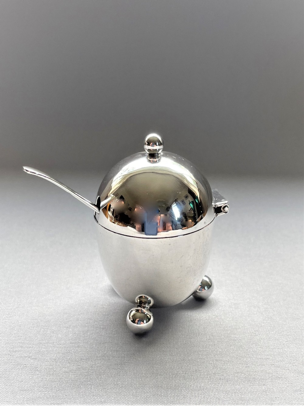 An unusual Victorian novelty silver 'egg' mustard pot & spoon