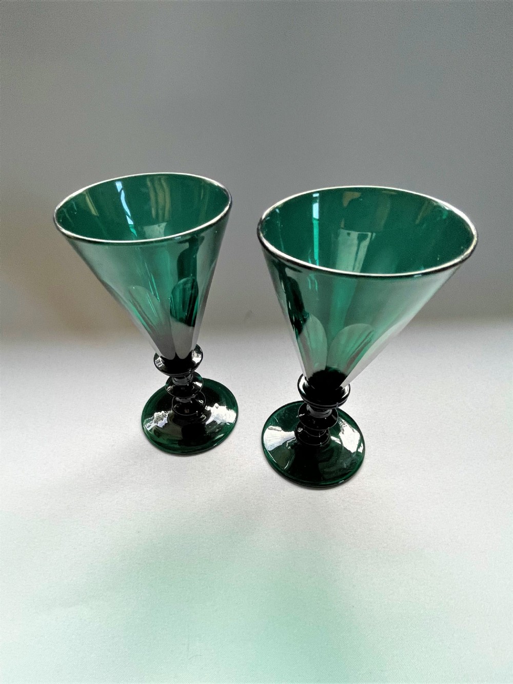 A pair of Georgian Bristol Green wine flutes View III
