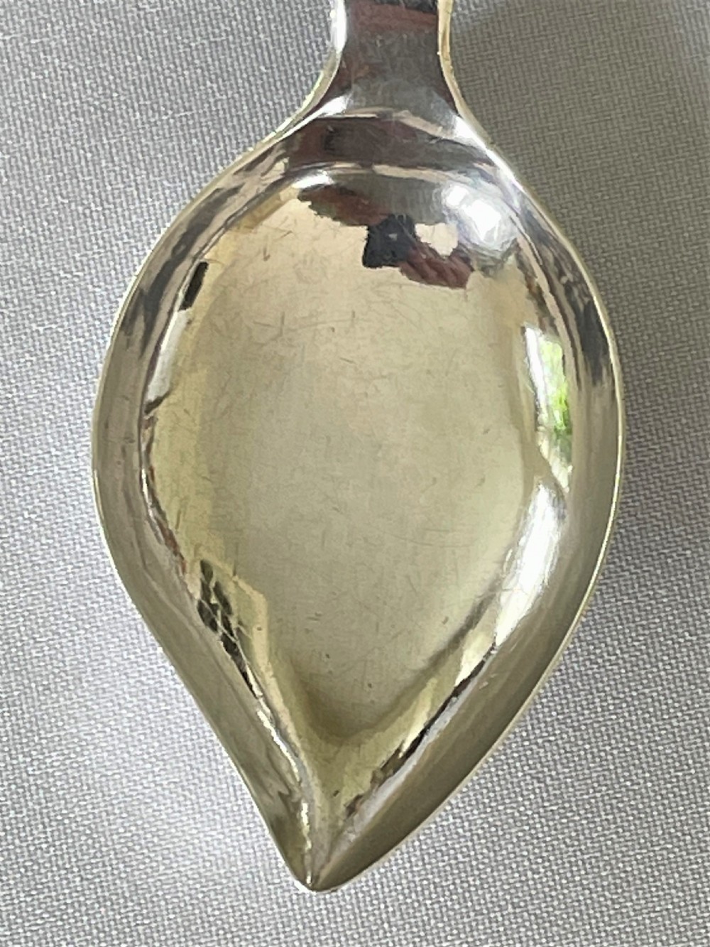 A Georgian silver leaf caddy spoon with heart handle View IV