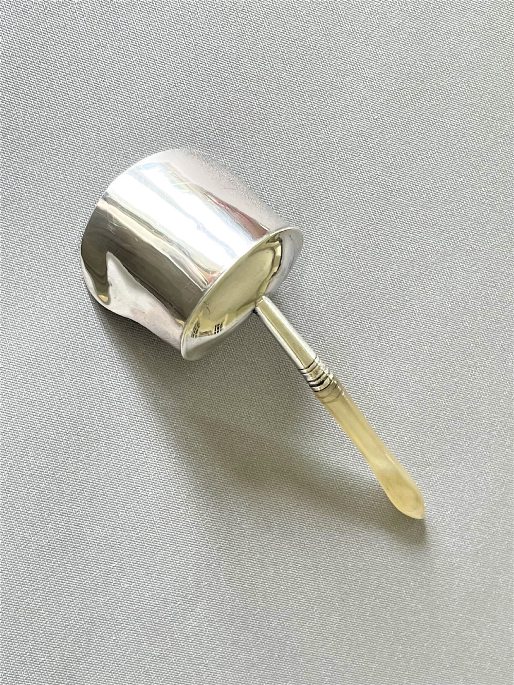 A superb Georgian silver & mother-of-pearl caddy shovel View V