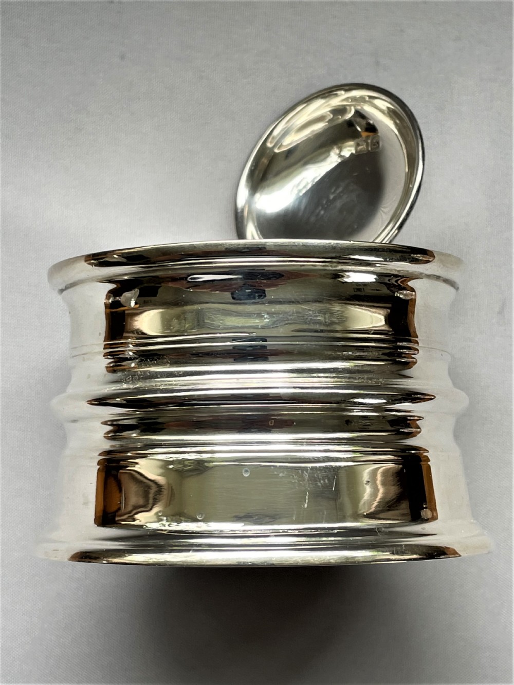 A handsome Barnard Family silver 'fishing reel' inkwell View V