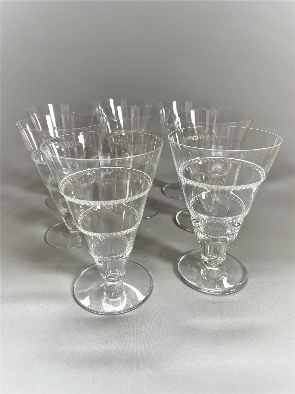 An outstanding set of 8 Lalique 'Vouvray' Pattern glasses