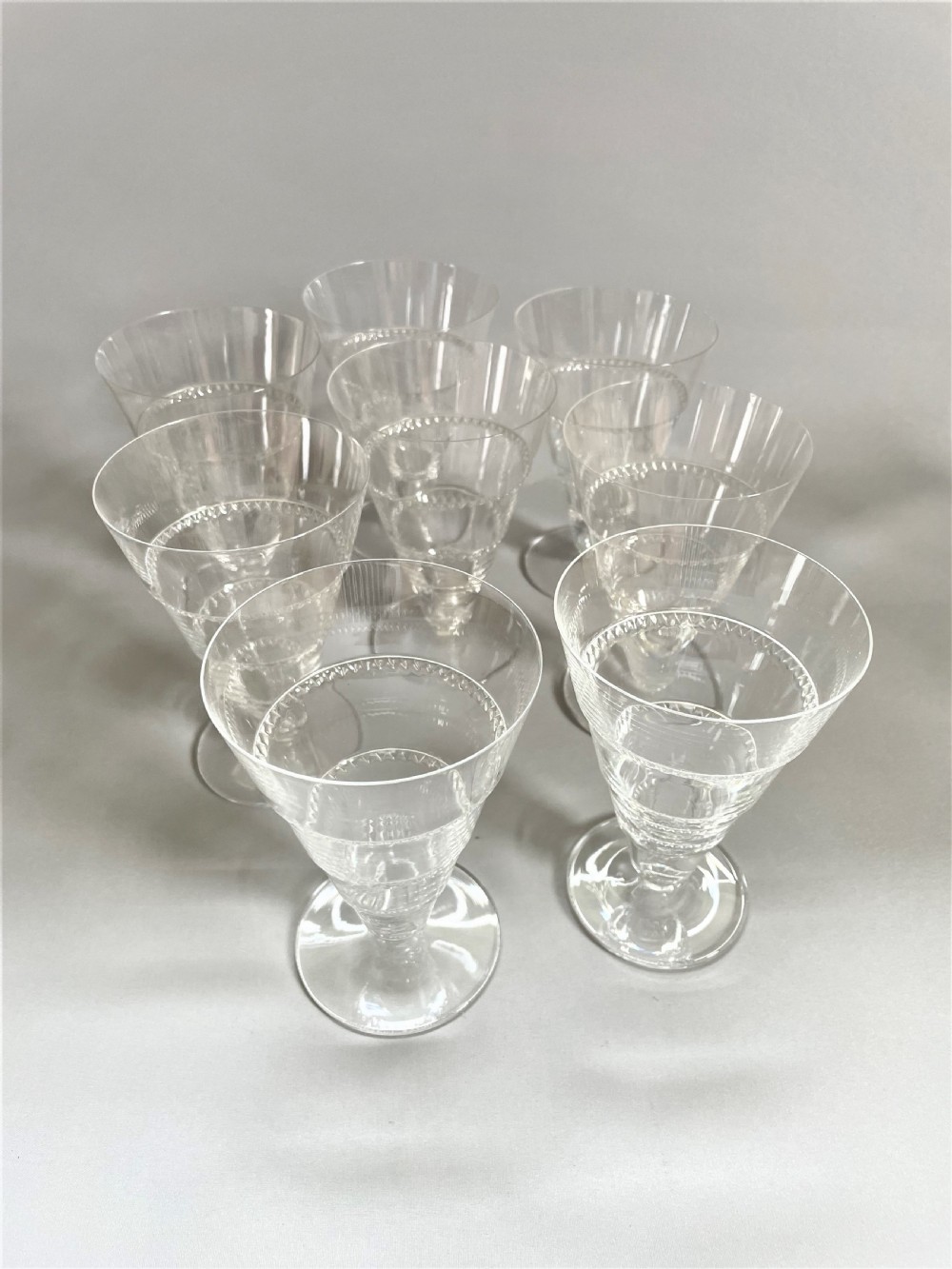 An outstanding set of 8 Lalique 'Vouvray' Pattern glasses View III