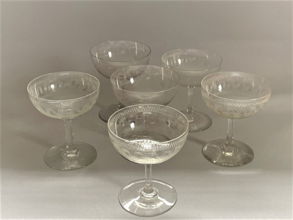 A set of 6 Edwardian Greek Key pattern champagne glasses
