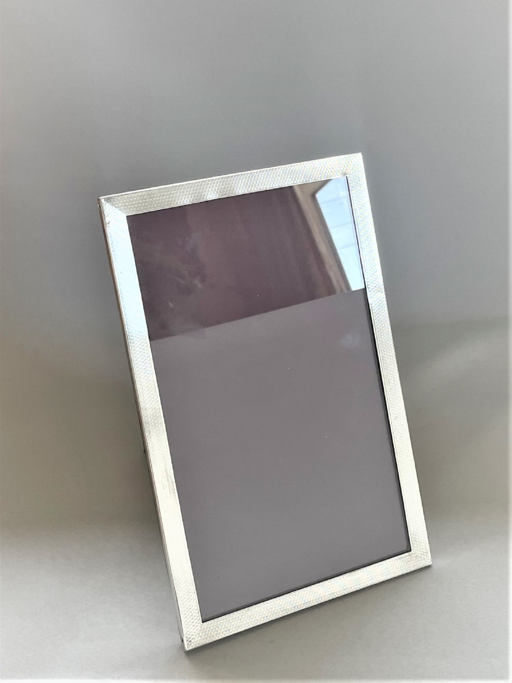 A superb Art Deco large silver photo frame
