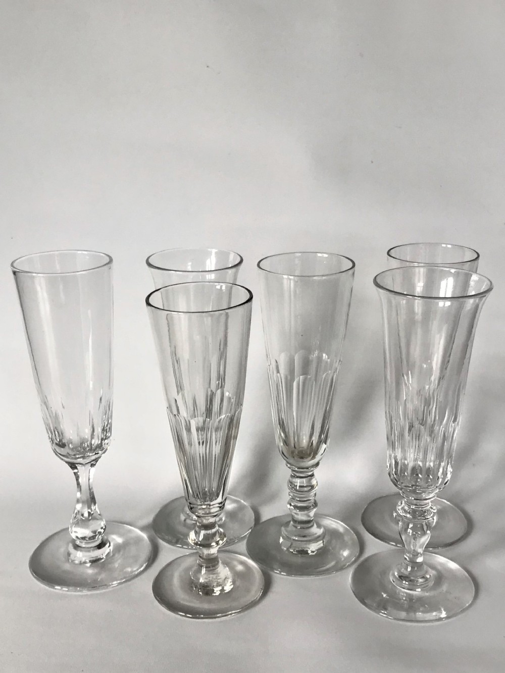 A harlequin set of 6 Victorian champagne flutes