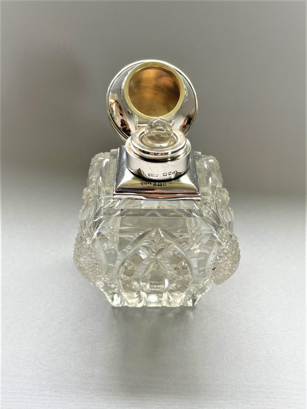 A stunning silver mounted cut glass table cologne bottle View III