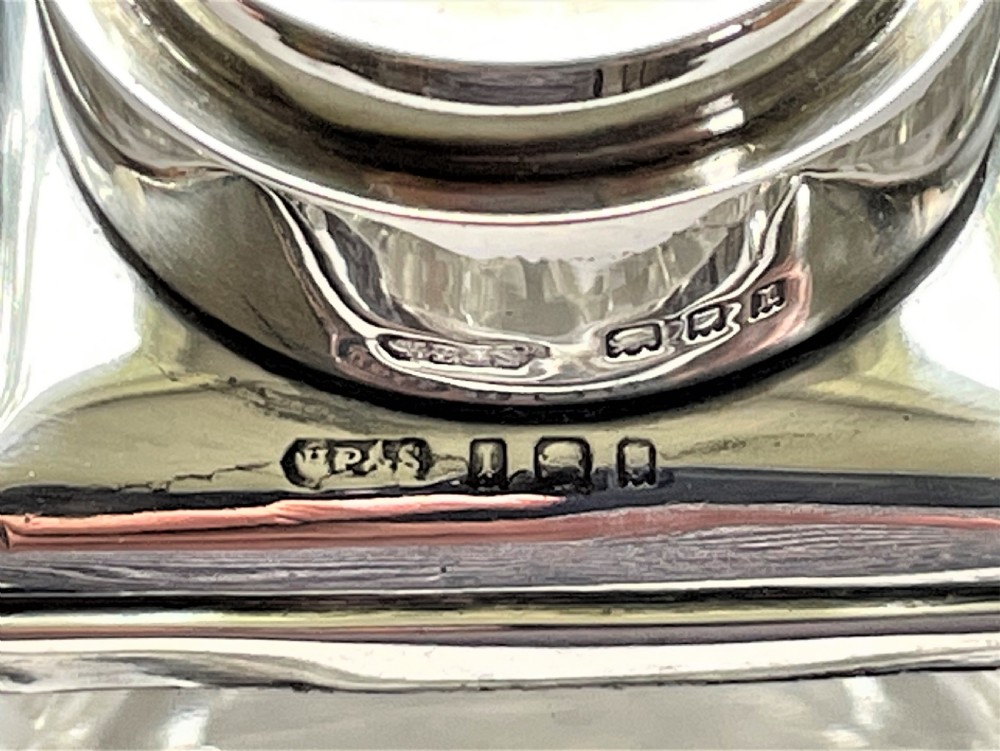 A stunning silver mounted cut glass table cologne bottle View V