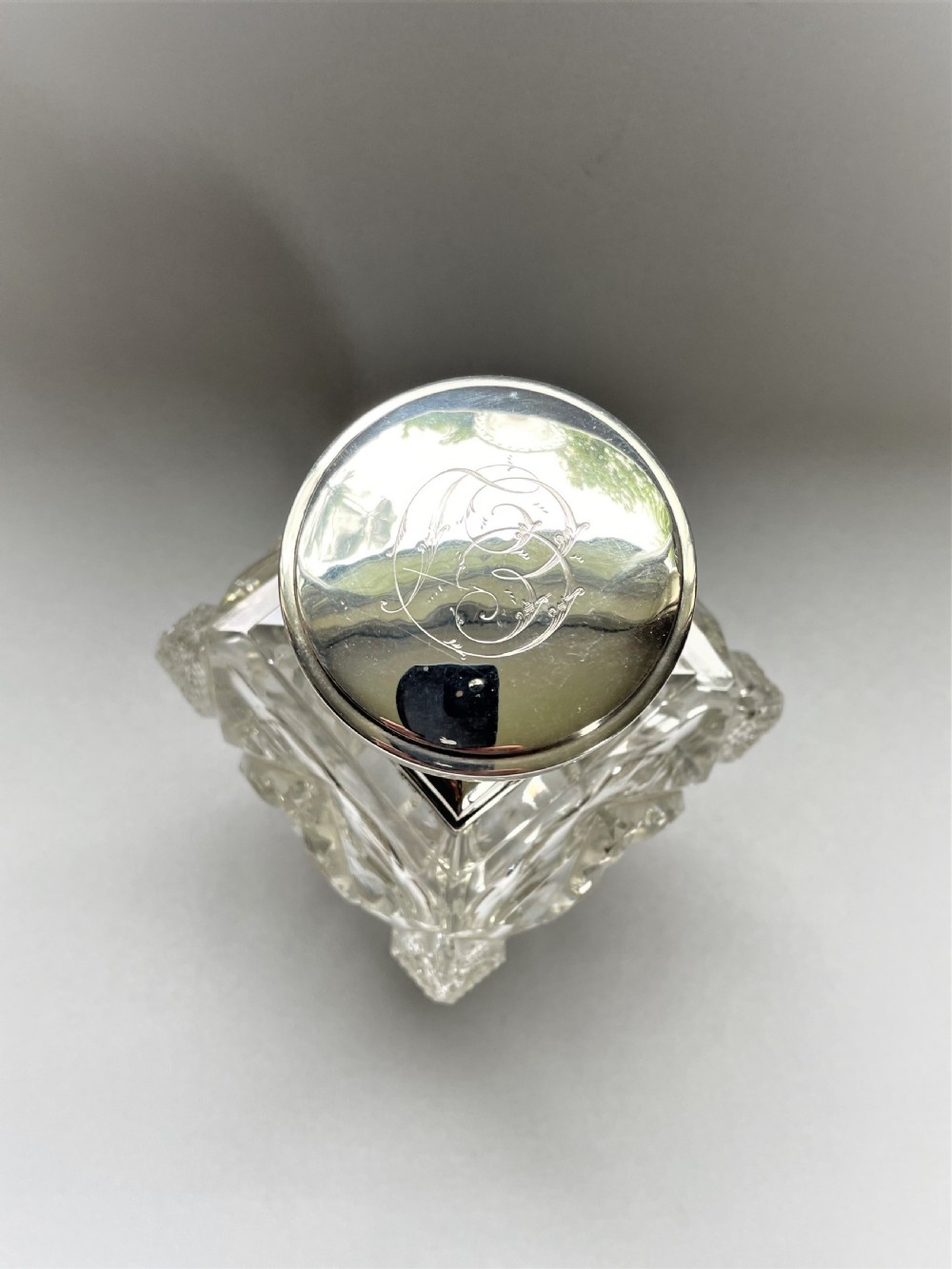 A stunning silver mounted cut glass table cologne bottle View VI