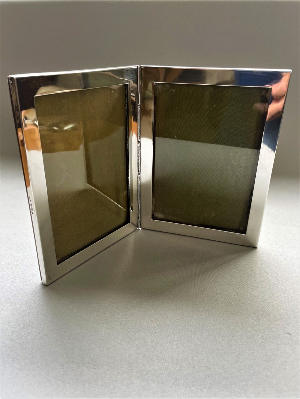 A rare silver double folding photo frame View III
