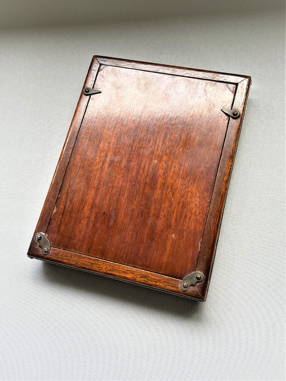 A rare silver double folding photo frame View V