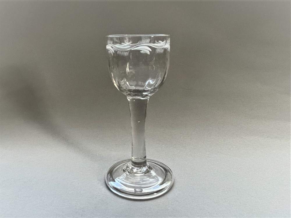 A gorgeous 18th Century etched cordial glass