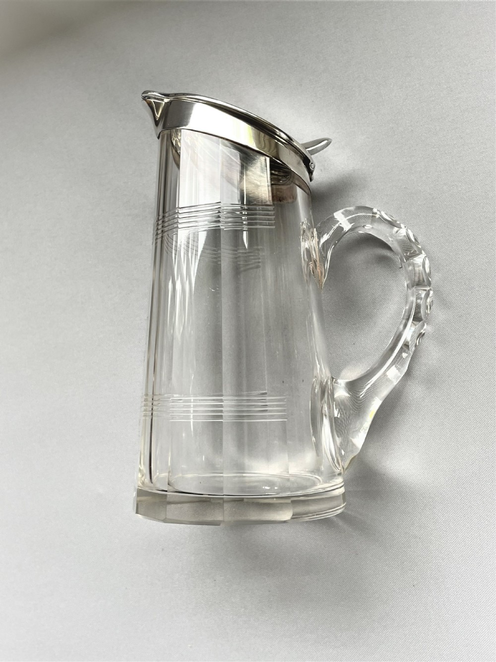 A desirable silver mounted cut glass Whisky companion View VIII
