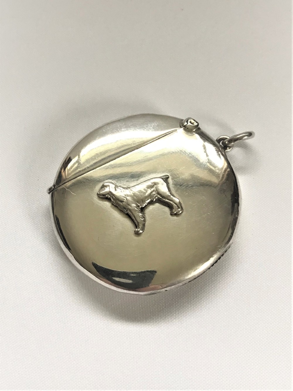 A Rare Circular Silver Spaniel Vesta