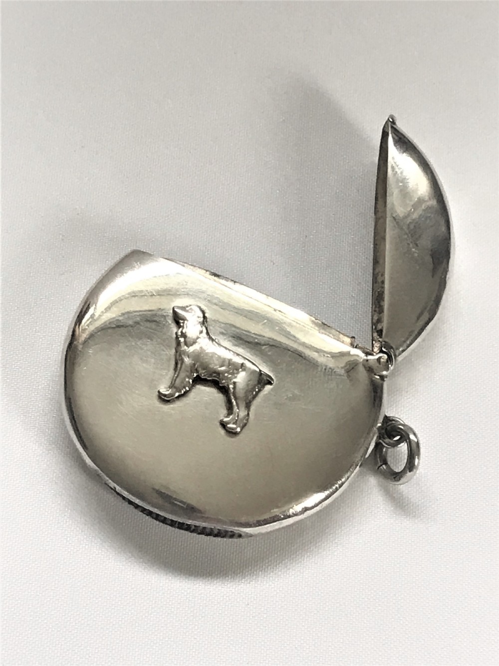 A Rare Circular Silver Spaniel Vesta View V