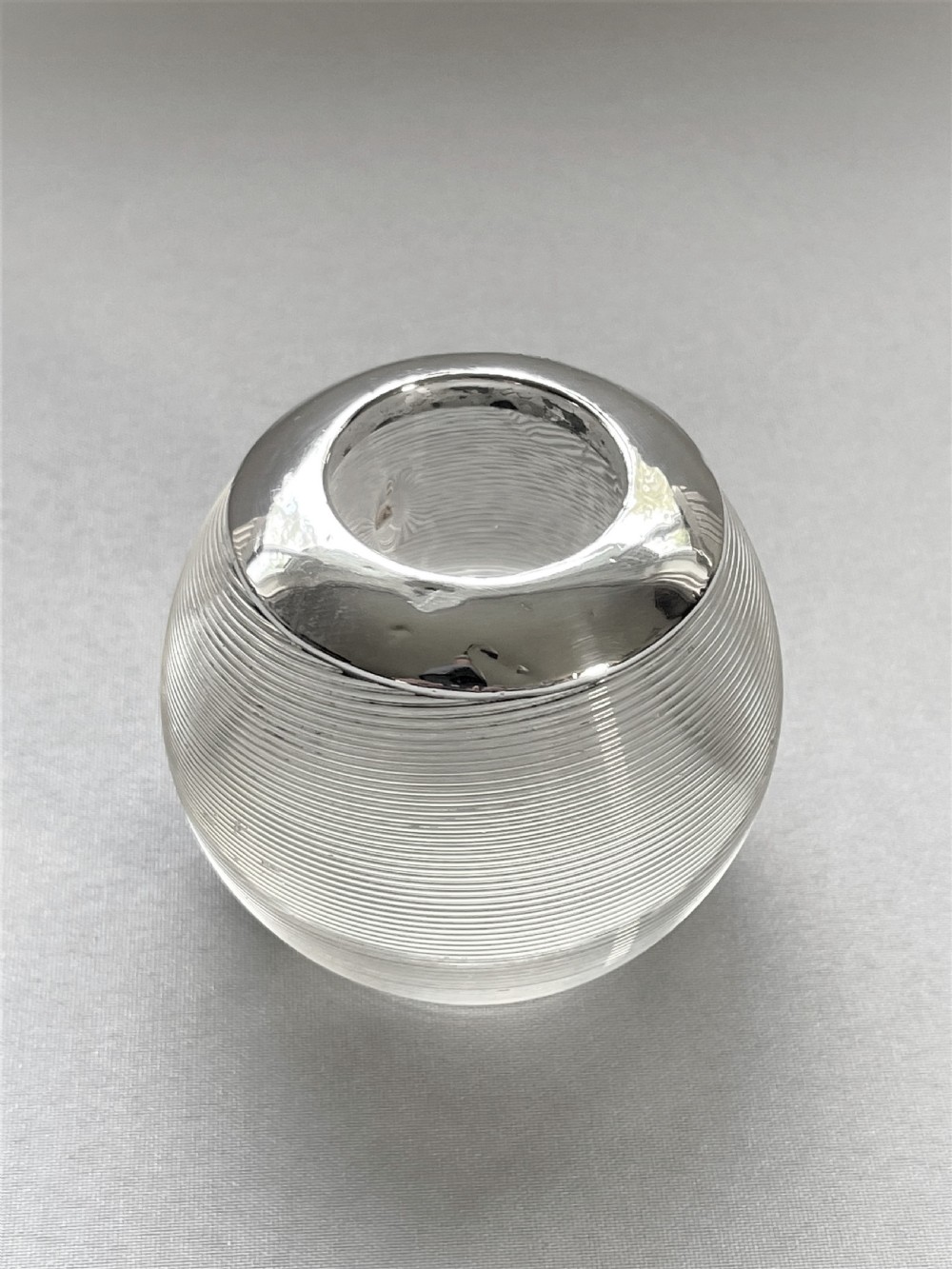 A fine silver mounted match striker