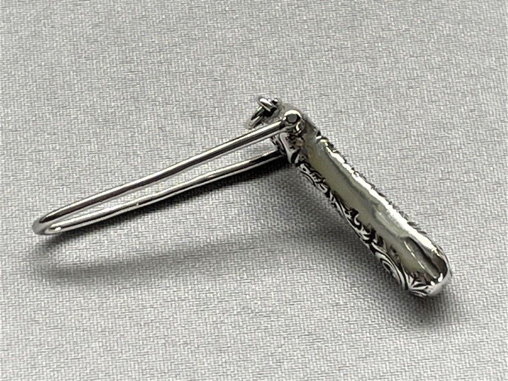 A rare Victorian folding silver ribbon threader View IV