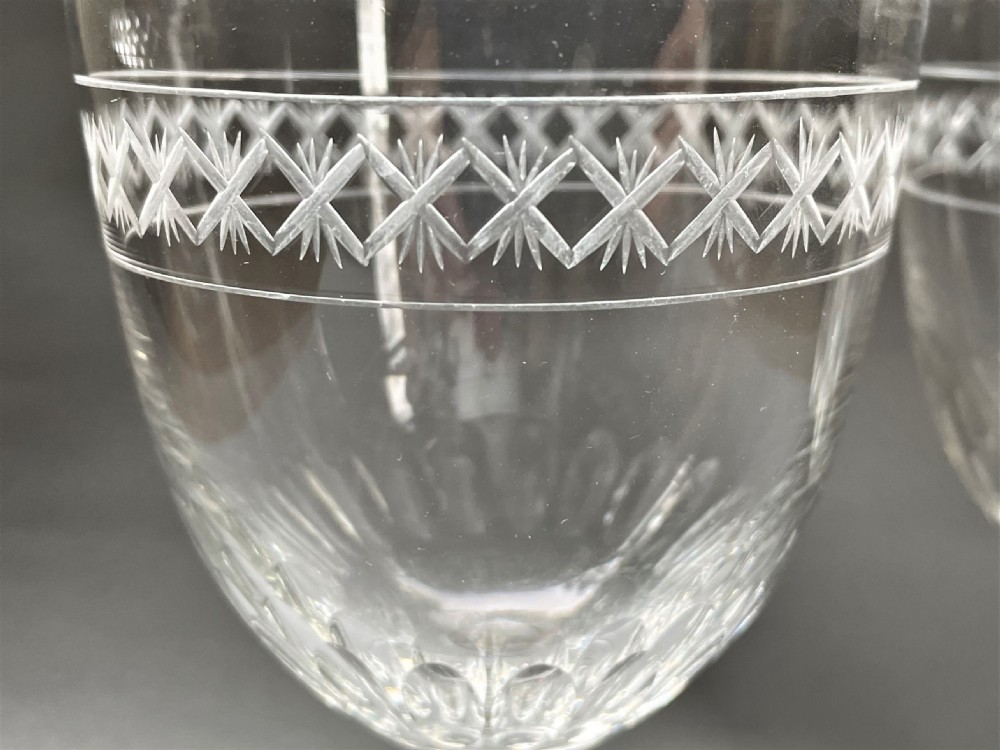 A handsome pair of late Victorian cut glass wine goblets View II