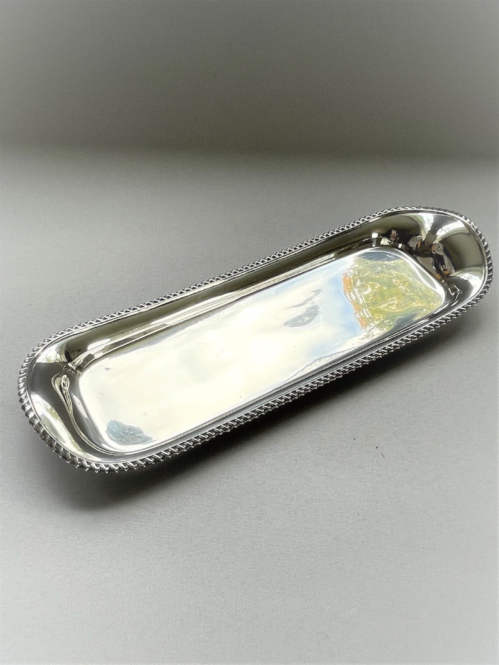 A handsome Edwardian silver pen tray