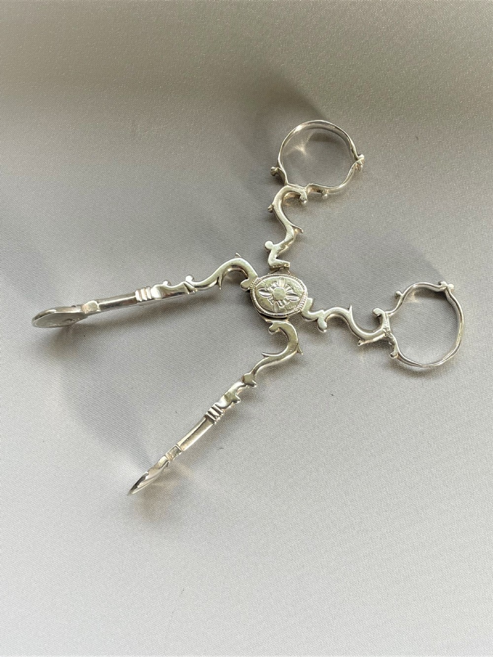 A pair of 18th Century Irish silver tea tongs View II