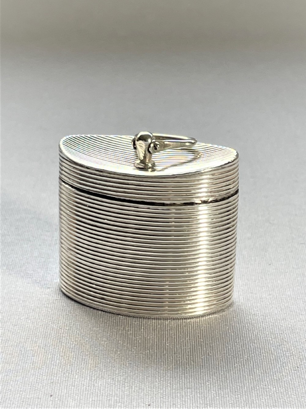 An exquisite novelty Chester silver thimble and case