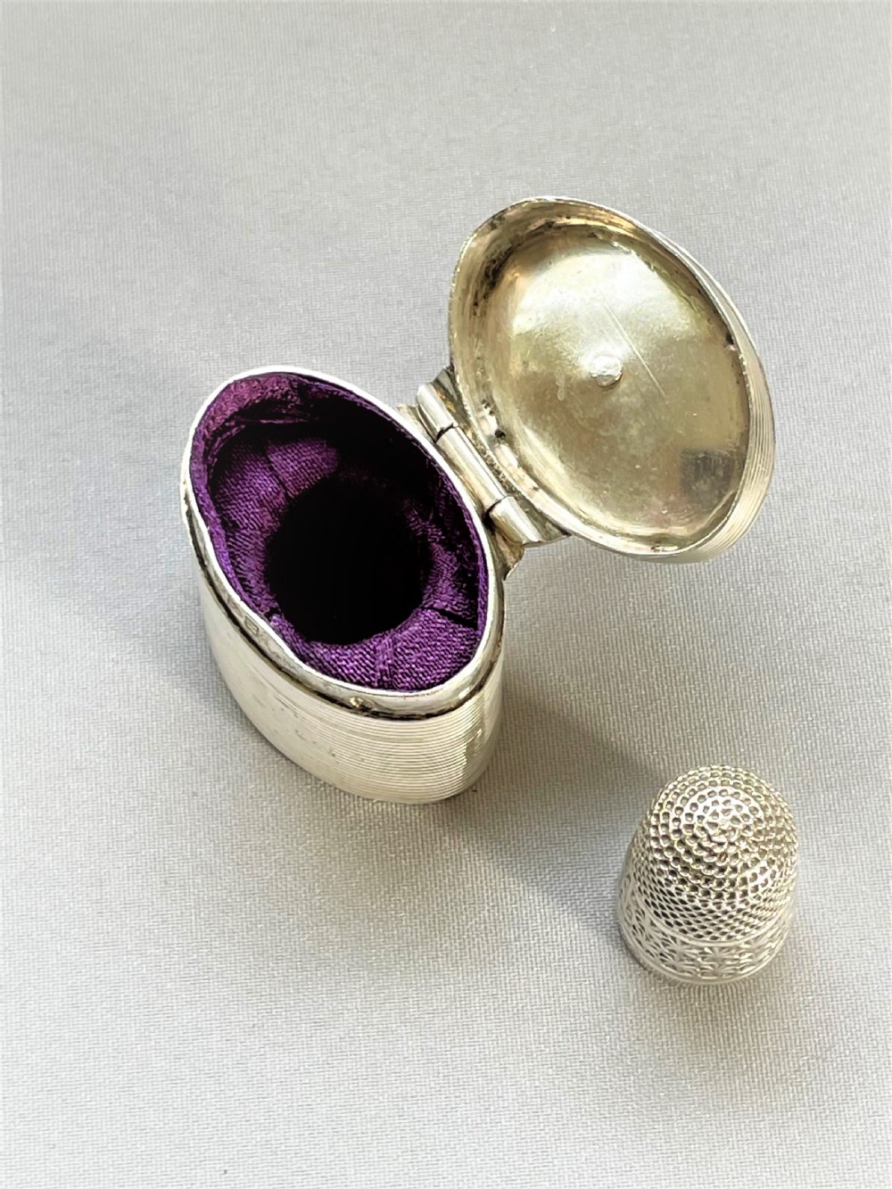 An exquisite novelty Chester silver thimble and case View VI