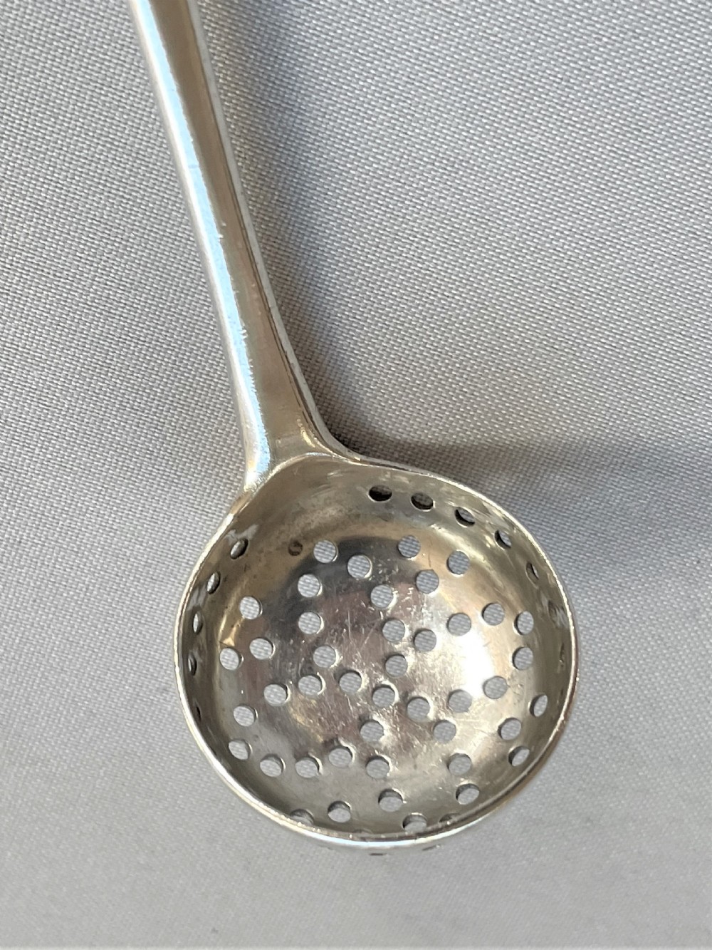 A desirable Georgian silver spice sifting ladle View II