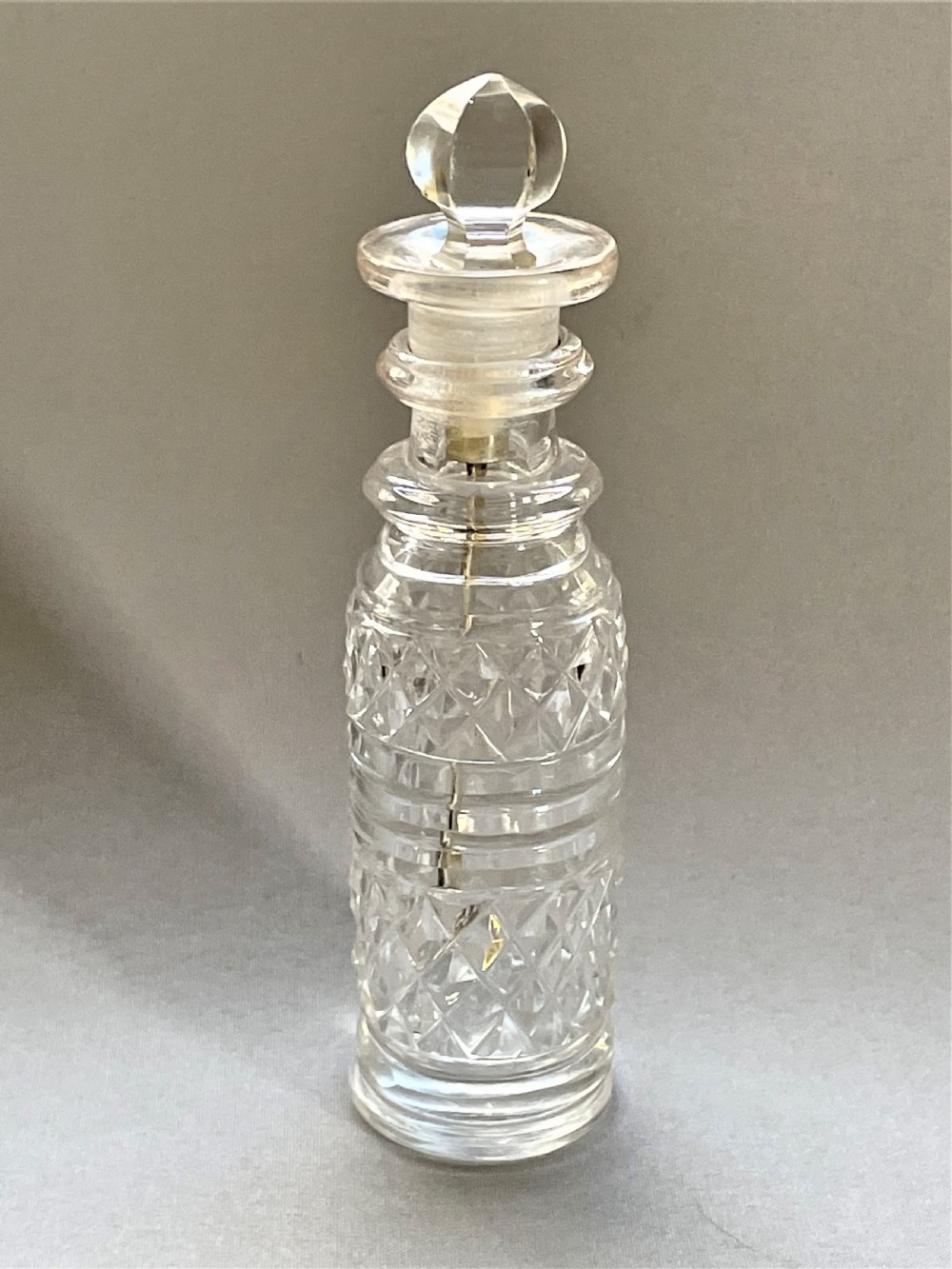 A rare Georgian cayenne bottle, with silver gilt spoon