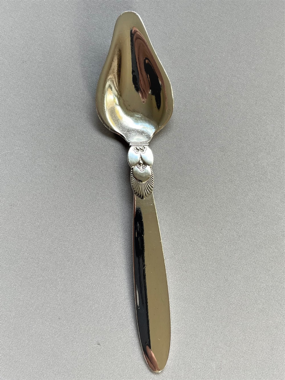 A stylish Georg Jensen silver preserve spoon