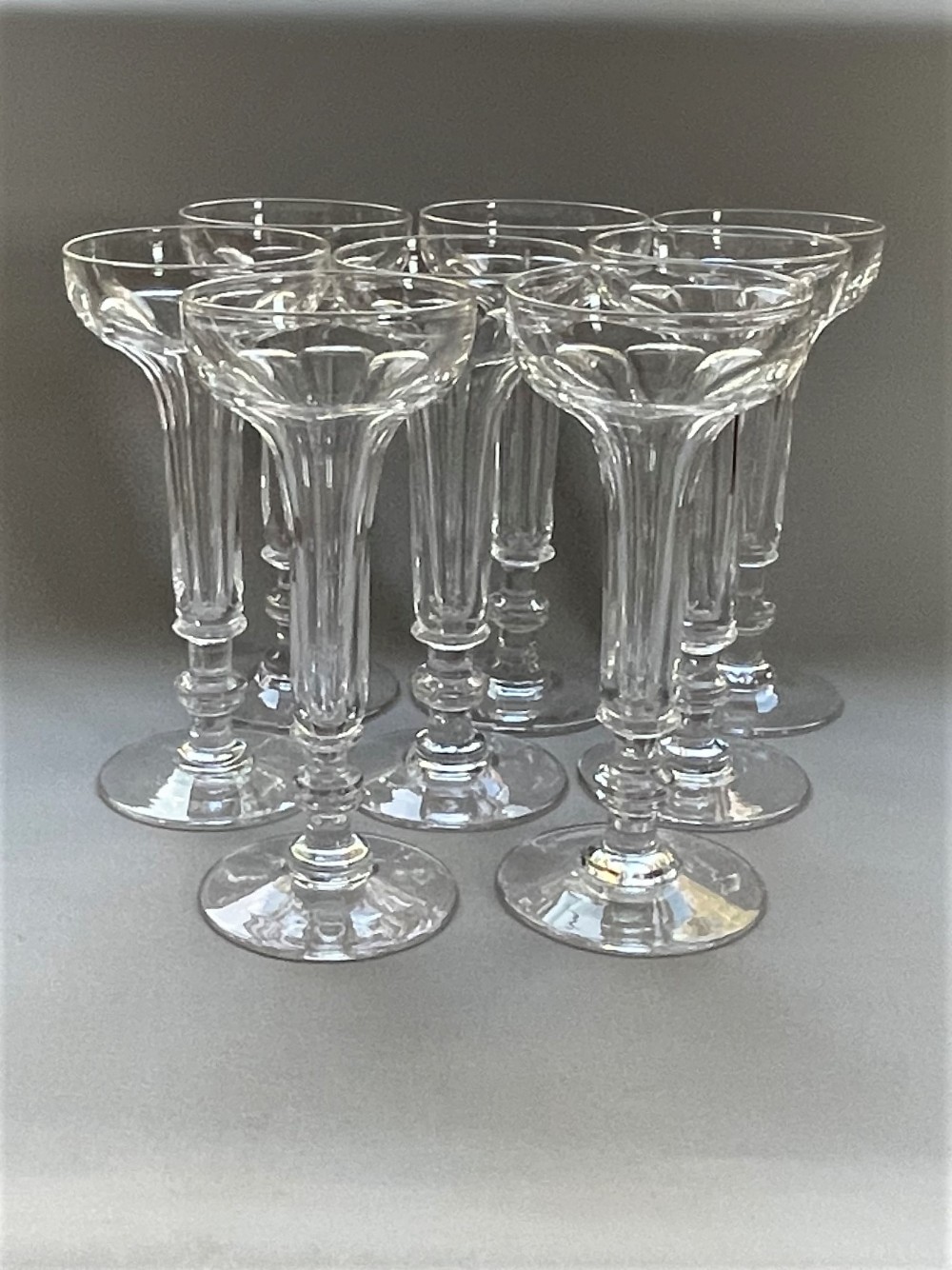 A fabulous set of 8 hollow stem champagne glasses