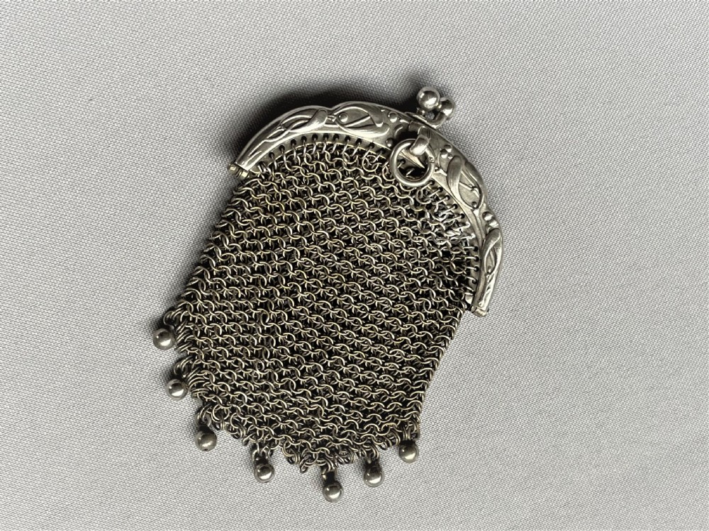 A seasonal themed French silver mistletoe coin purse
