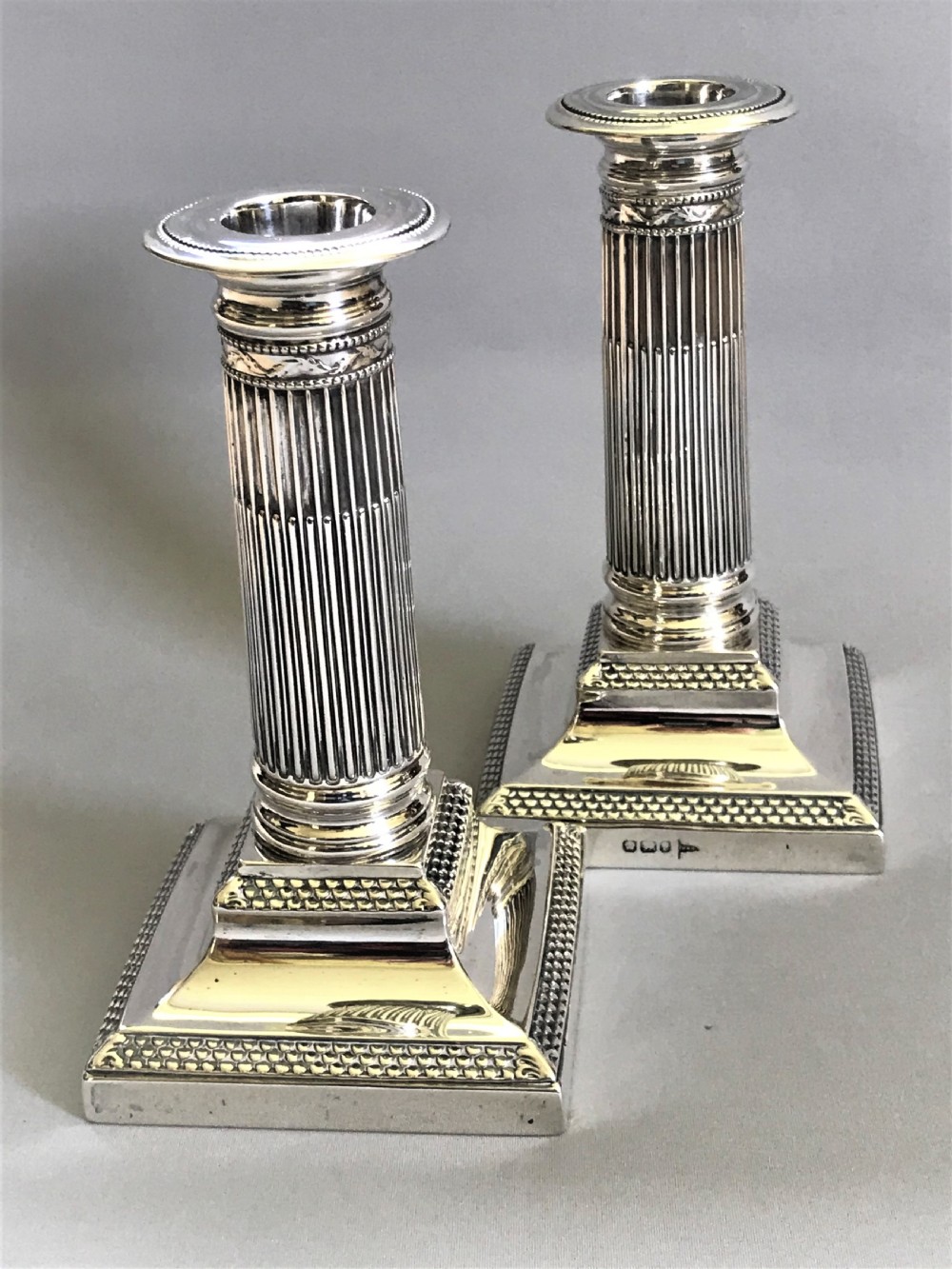A superb pair of Victorian silver candle sticks