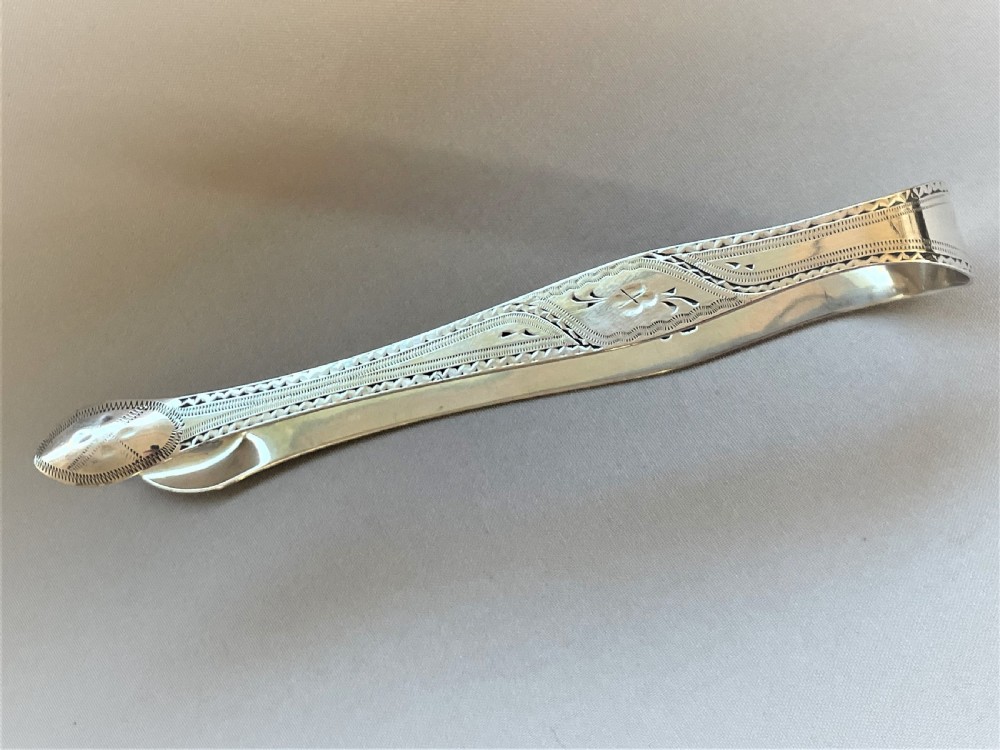An extremely rare pair of Peter & Jonathan Bateman silver tongs