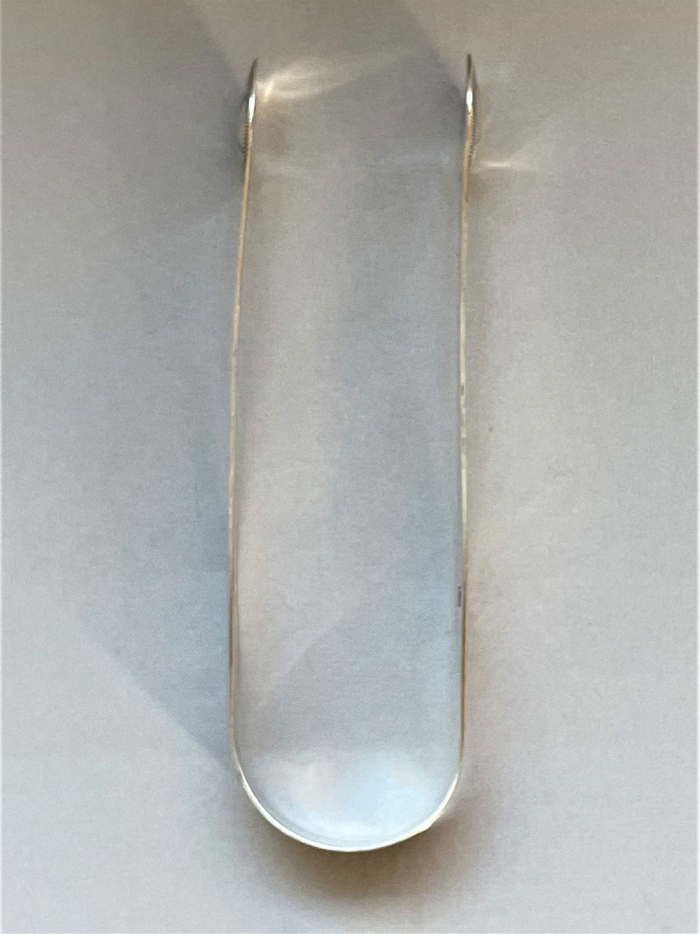 An extremely rare pair of Peter & Jonathan Bateman silver tongs View VI
