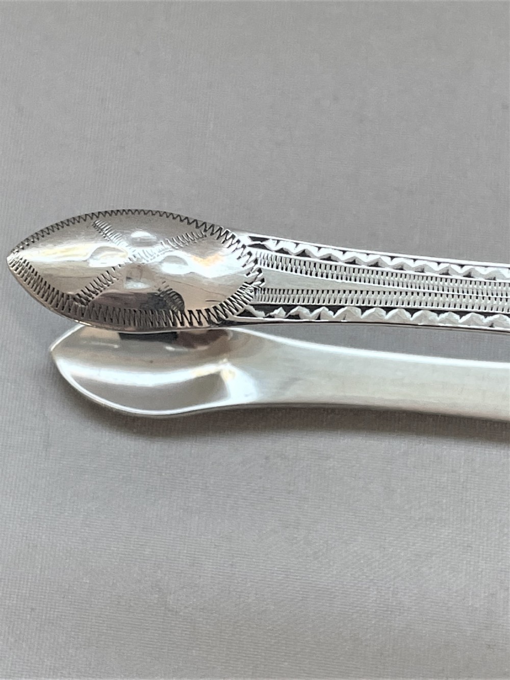An extremely rare pair of Peter & Jonathan Bateman silver tongs View VII
