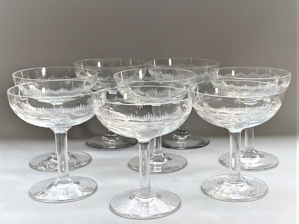 A good set of 8 Edwardian etched champagne bowls