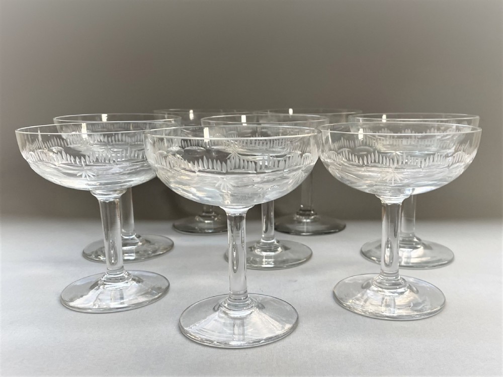 A good set of 8 Edwardian etched champagne bowls View III