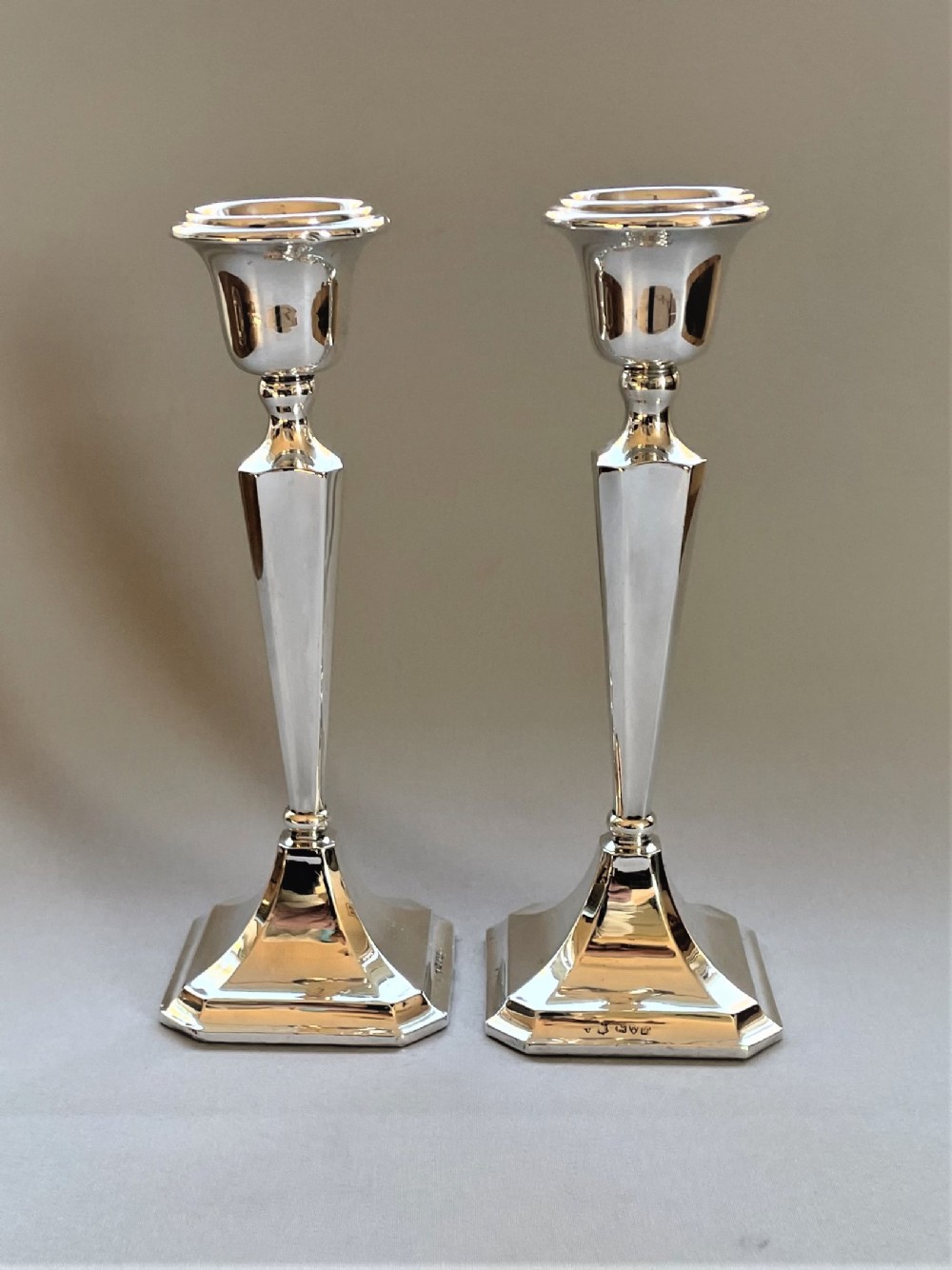 A stylish pair of Chester hallmarked silver candlesticks