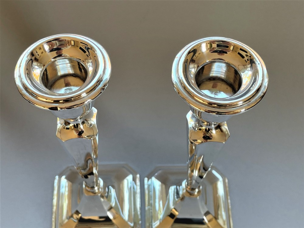 A stylish pair of Chester hallmarked silver candlesticks View V