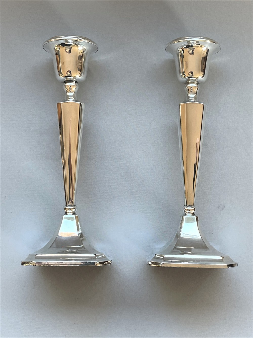 A stylish pair of Chester hallmarked silver candlesticks View VI