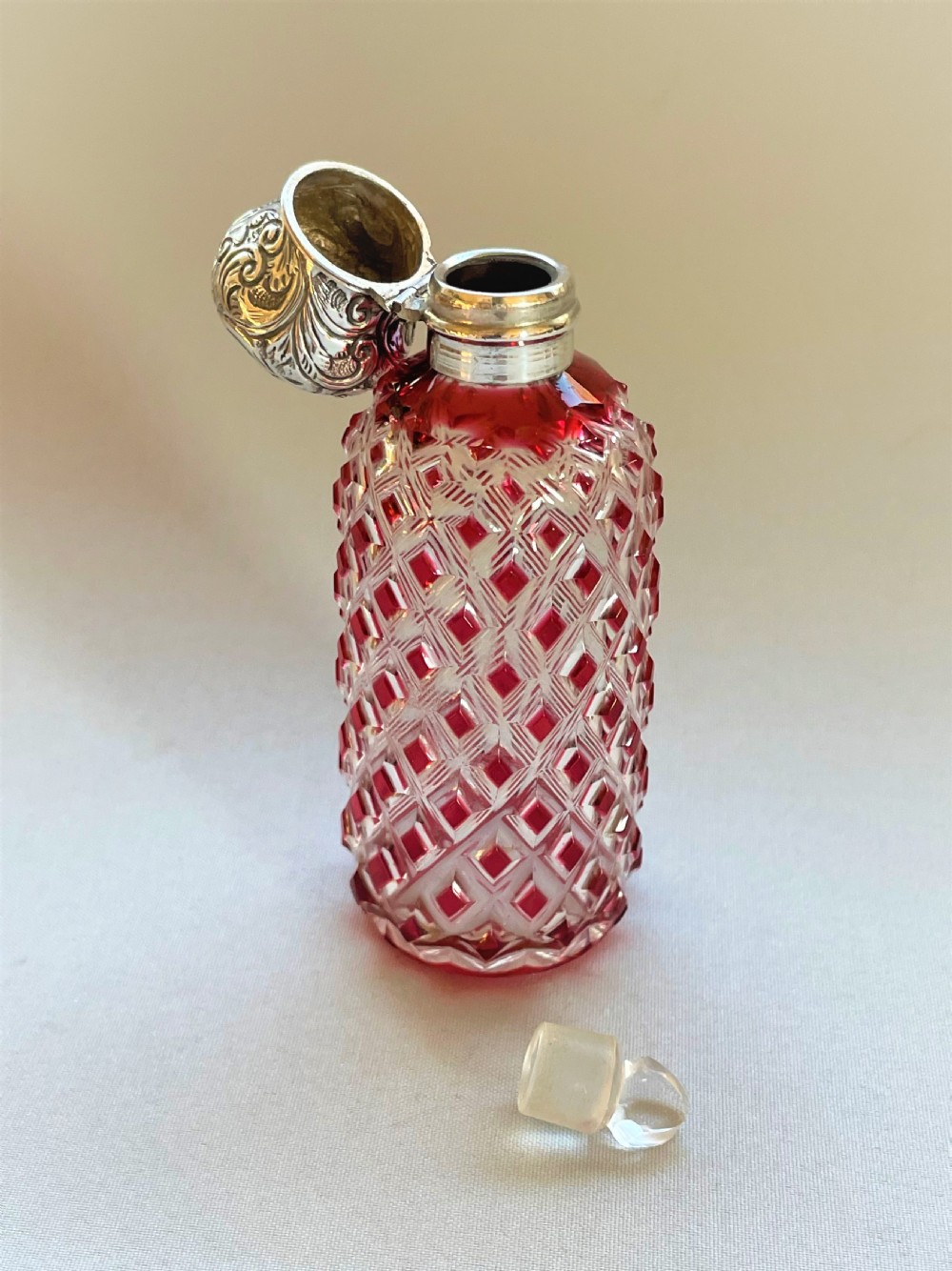 A Victorian silver mounted cranberry scent bottle View IV