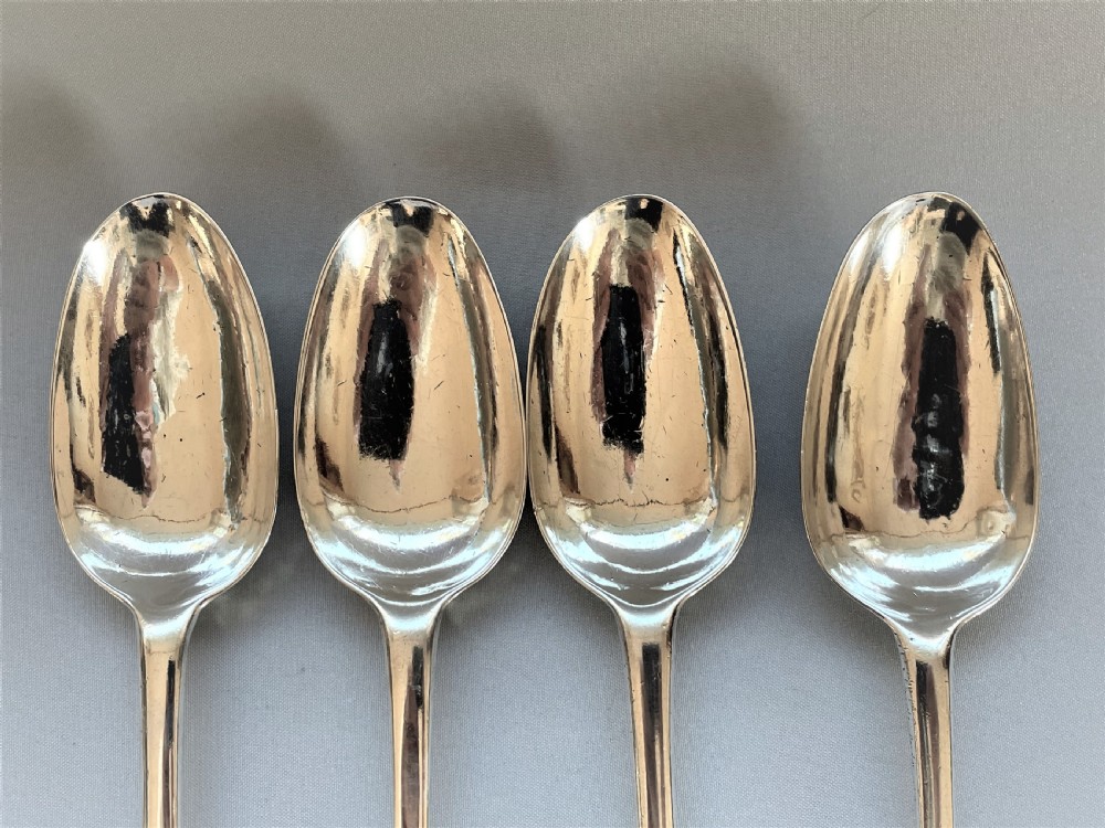 A fabulous set of 4 rat-tail early 18th Century silver table spoons View IV