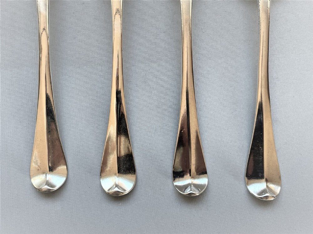 A fabulous set of 4 rat-tail early 18th Century silver table spoons View V