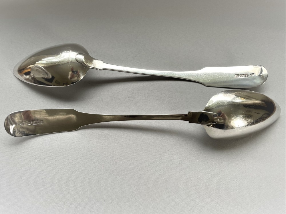 An outstanding duo of Irish Georgian silver basting/straining spoons View IV