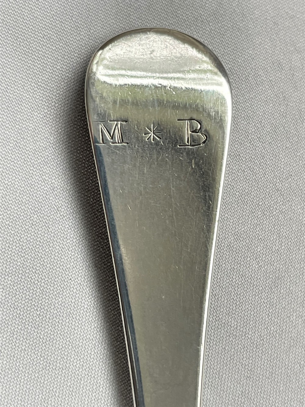 A lovely 18th Century silver shell-back tablespoon View V